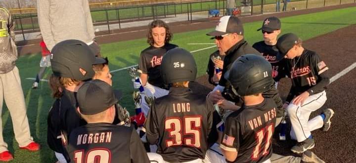 11/12U post-game huddle with coach