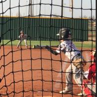 Eli #35 batting and Malcolm the base runner on 1st